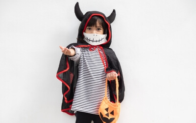 halloween hoodie over long-sleeve shirt